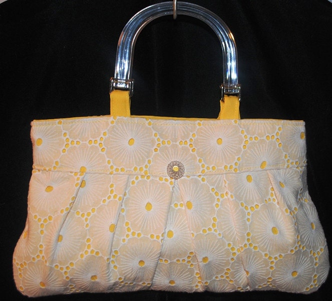White eyelet and yellow purse with acrylic handles