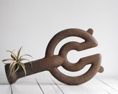 antique industrial burner sculpture