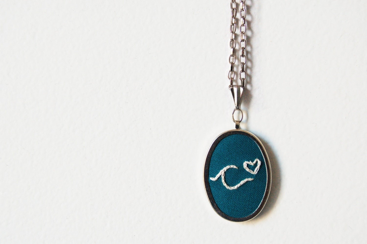 Embroidered Necklace with Initial and Heart Pendant.  Custom Hand Stitched Pendant. by merriweathercouncil on Etsy