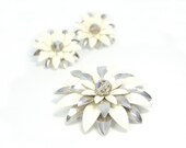 Sarah Coventry brooch and clip on earrings set.  Silvertone painted with winter white.  A lovely gift or collectible.  Free shipping