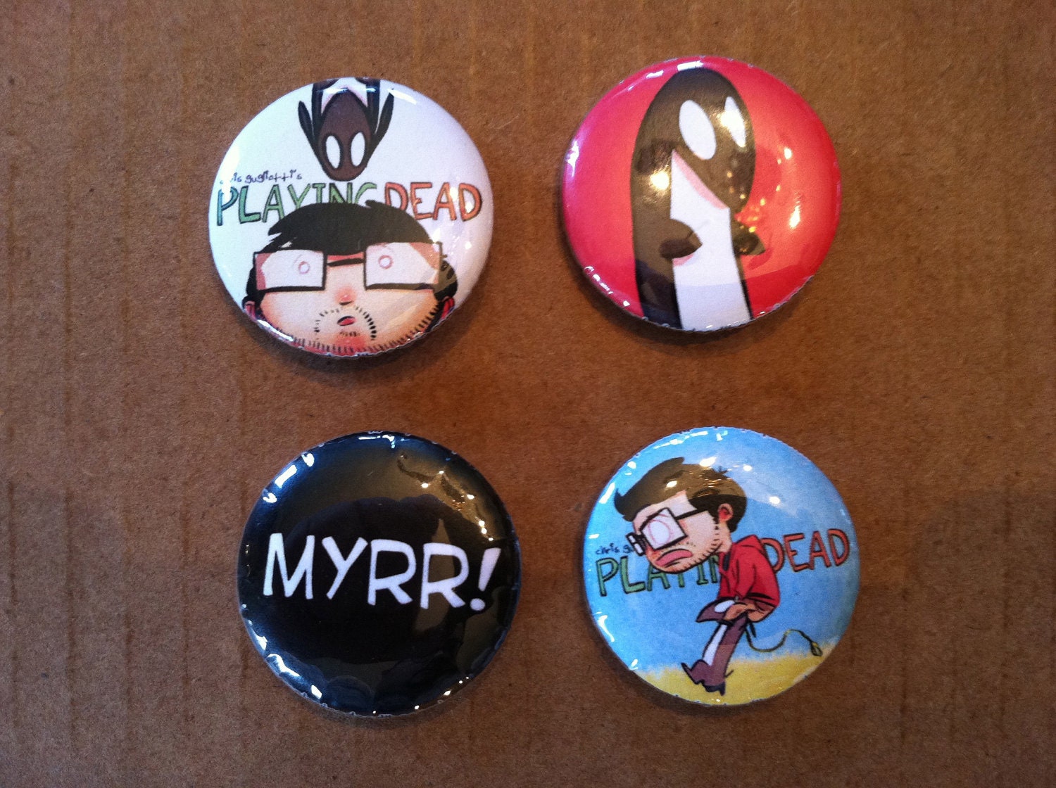 Playing Dead set of 4 buttons