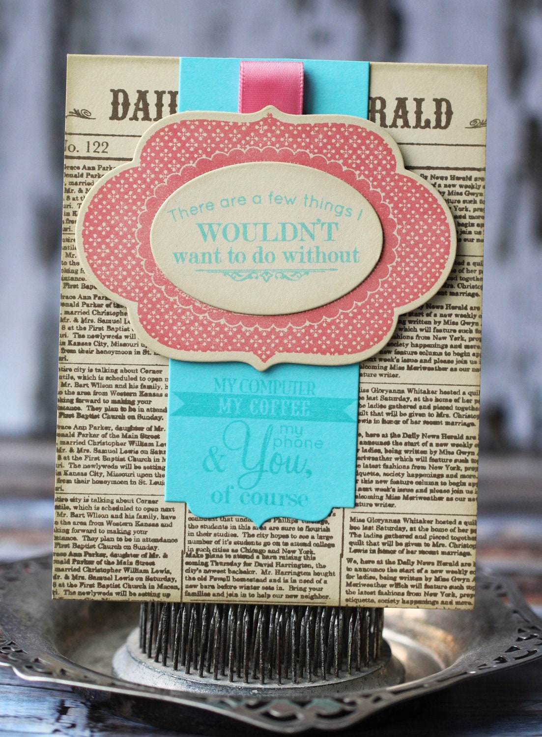 There a few things I wouldn't want do without - handmade card,  newsprint background