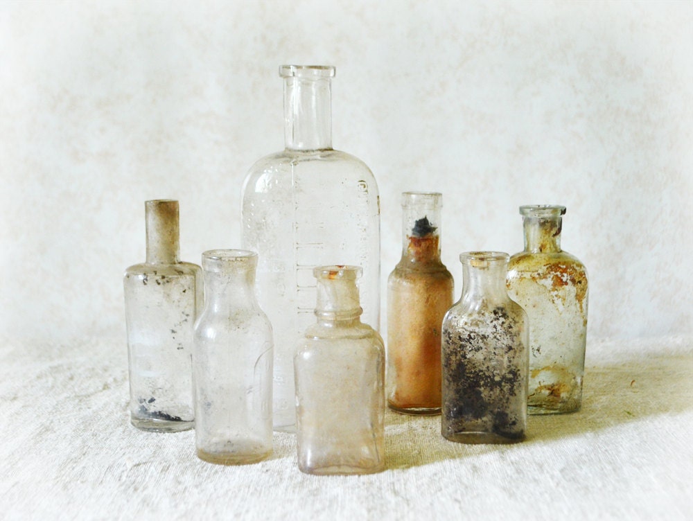 7 Antique French Bottles Embossed small collection