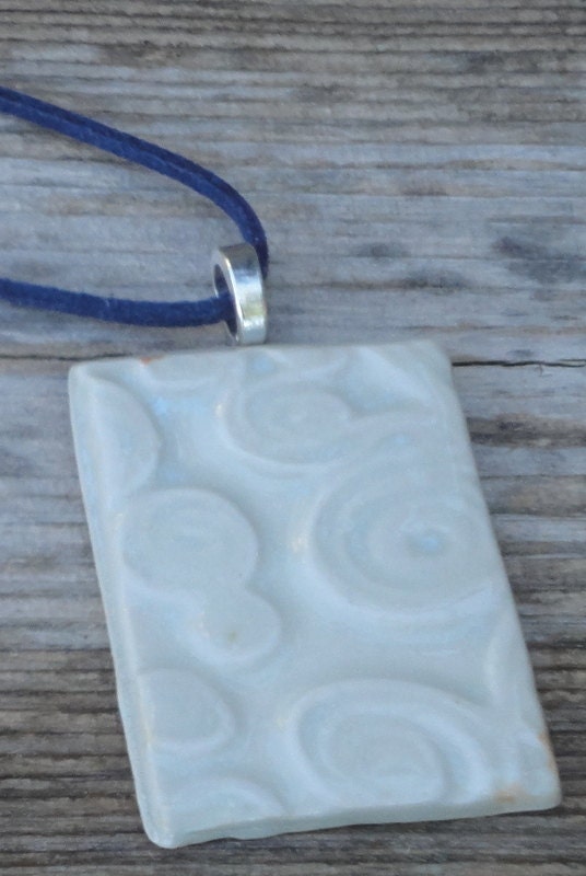 Pottery  Necklace in  cloudy day with navy blue suede cord
