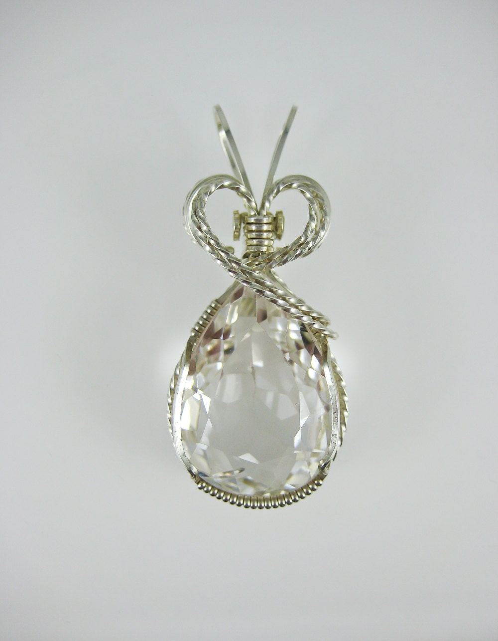 Silver wire wrapped quartz gemstone pendant
