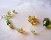 Leaves, sun,handmade, suncatcher, green crystals, yellow, green pearls, whimsical, fun, colorful