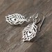 Silver Peacock Feather Earrings / Sterling Silver Metal Cutout Dangle Earrings / Simple Statement Jewelry by burnish