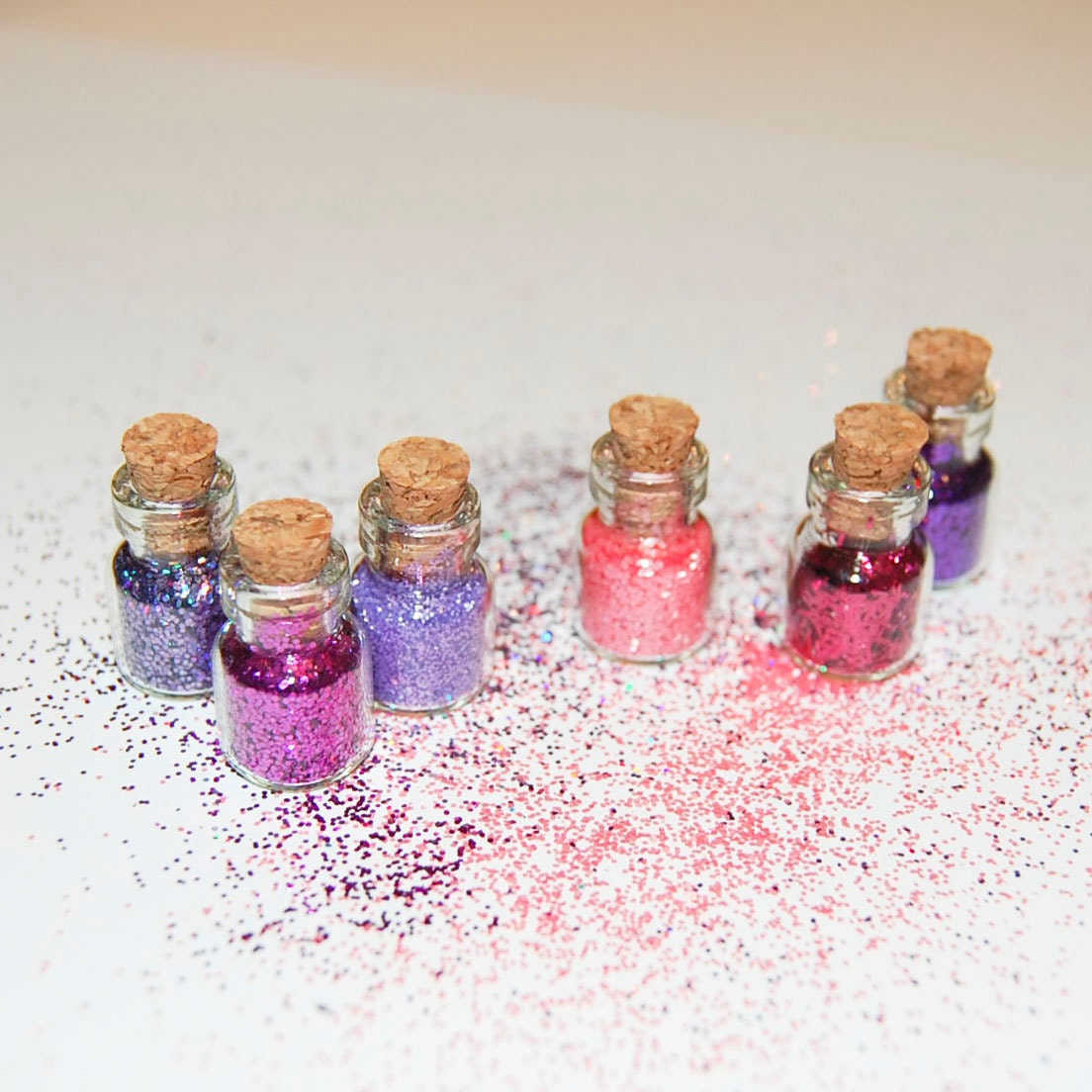Miniature Nail Glitter in Pink and Purple: Sampler of 6 SOLVENT RESISTANT Glitters in Tiny Glass Bottles with Cork