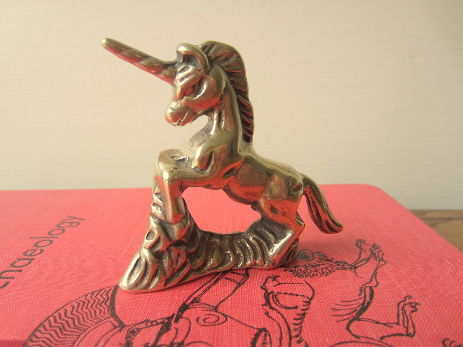 Brass unicorn.  Unicorn.