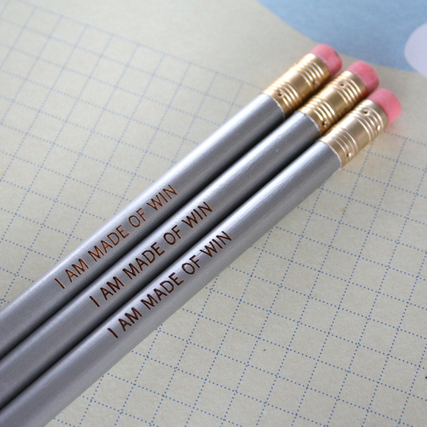 I am made of win. 3 three silver Self congratulatory pencils make writing and test taking fun again. halloween treats that won't rot teeth.