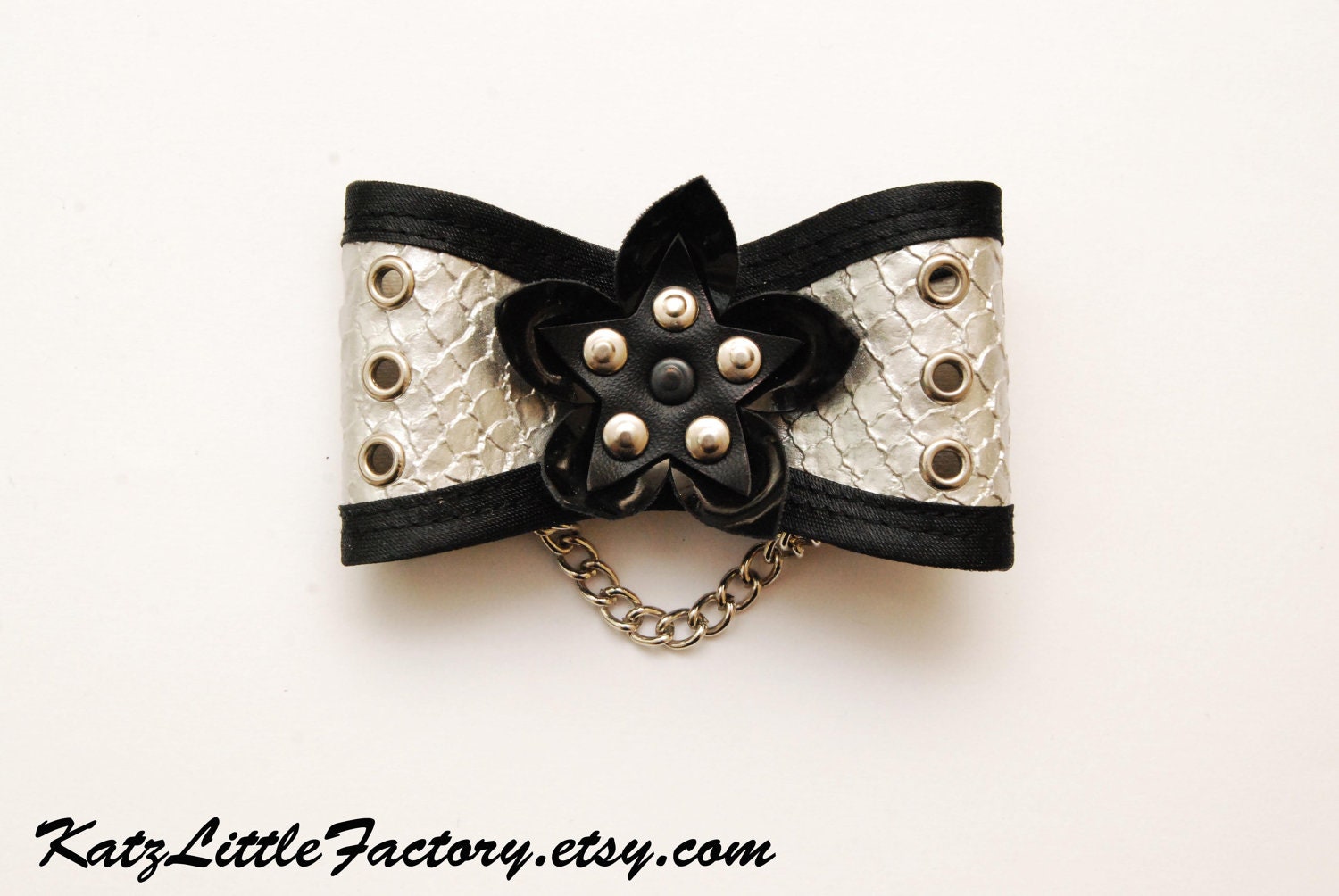 Silver reptile skin and black PVC Cyber Flower bow hair clip gothic industrial with eyelets and chain