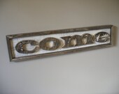 Upcycled Come (Spanish word for EAT)