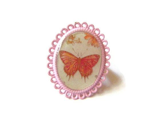 Pink ring with orange butterfly