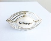 CAGED - Sterling Silver Cowrie Shell Ring