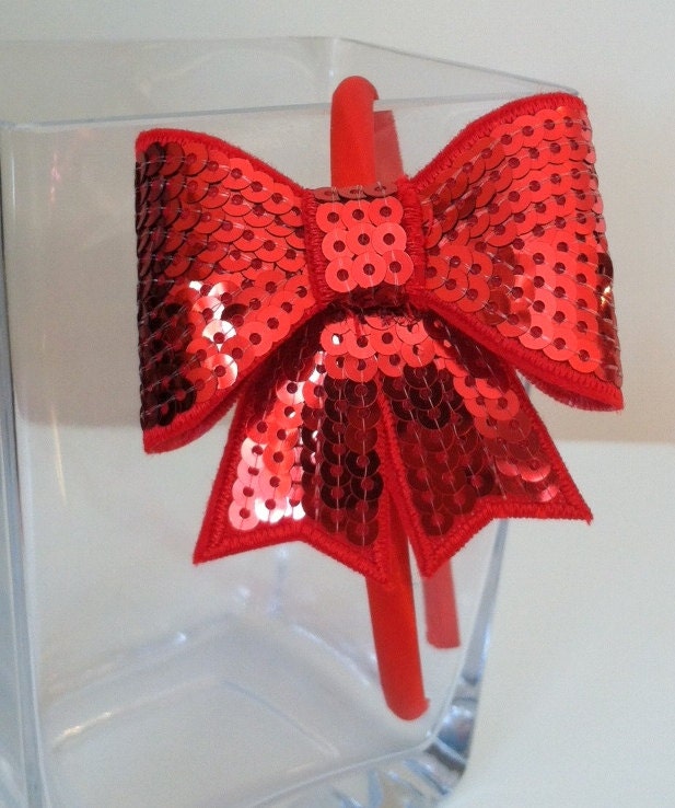 Red Sequin Bow Attached to a Red Satin Headband