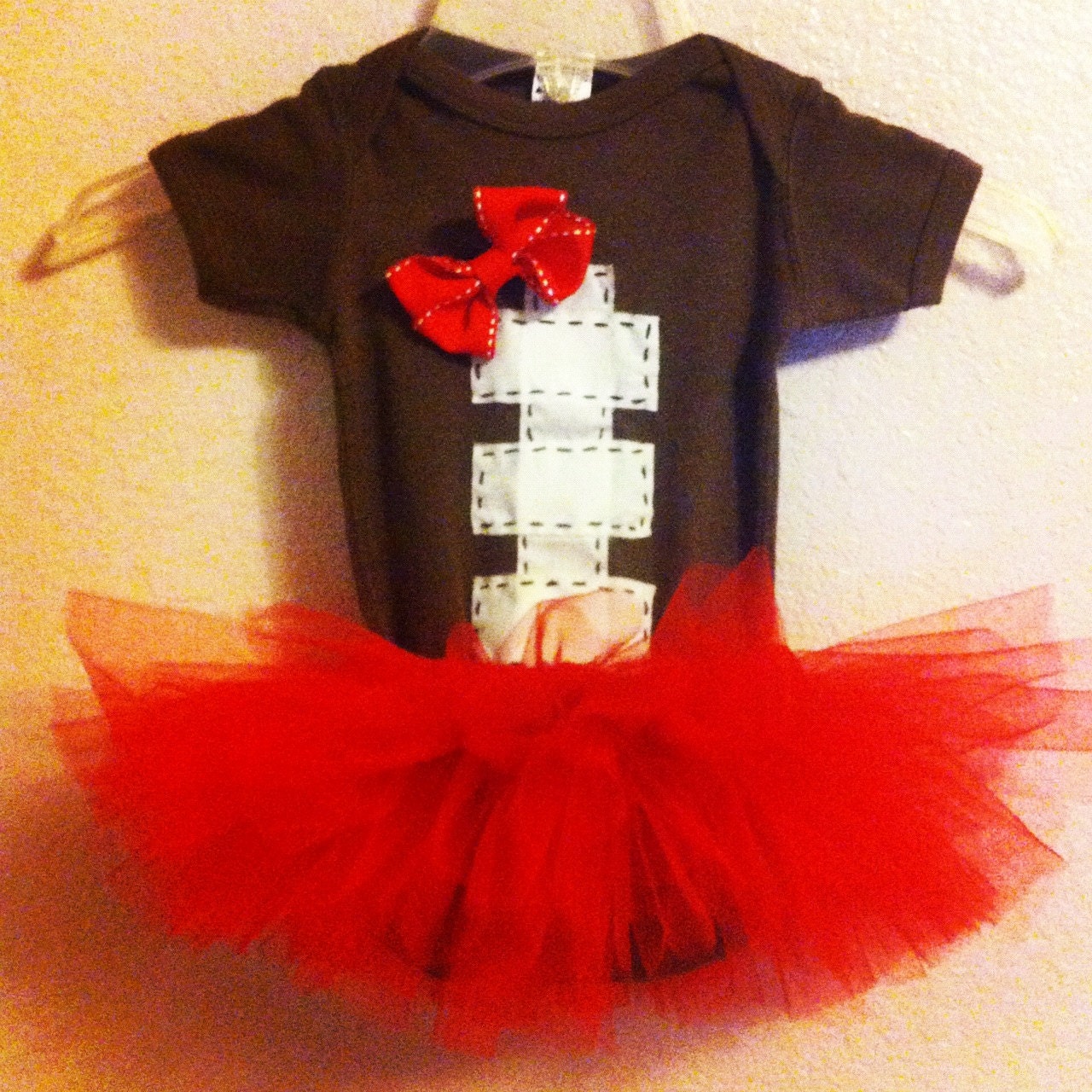 Football baby onesie and tutu With matching hair bow in sizes: newborn, 0-3mo, 3-6mo, 6-12mo, 12-18mo(t-shirt),or 18-24mo