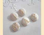 embroidered buttons handmade in cream silk with personalised lettering, pack of five, size15mm