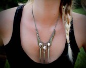 Silver Spiked Necklace with White Skulls