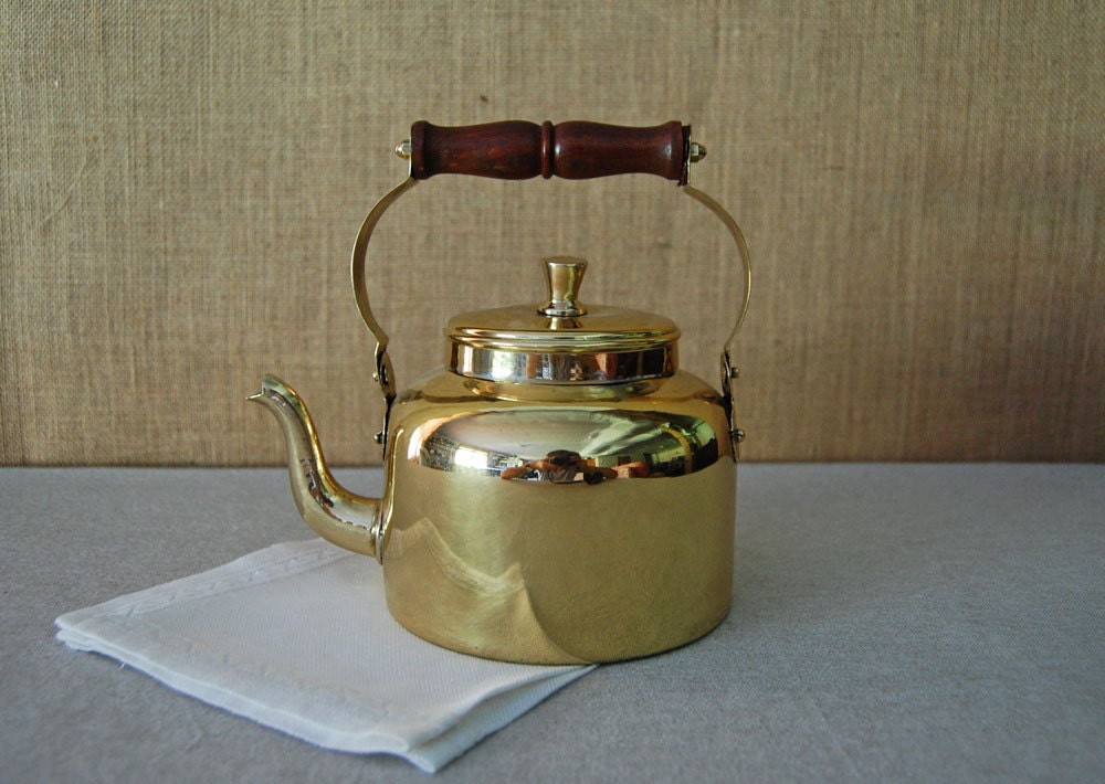 vintage restored brass tea kettle with wood handle