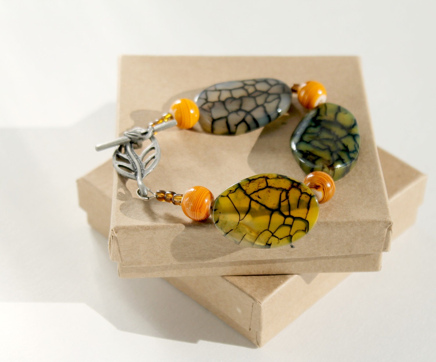 Beaded Bracelet, Green and Amber Beaded Bracelet with Amber Swirl Glass Beads and Leaf Toggle Clasp