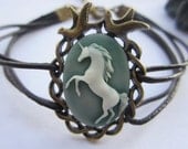 Unicorn Bracelet---antique bronze love birds with green resin unicorn&brown leather chain