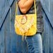 Felted handbag yellow with unique ethnic designs