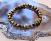 the buddha bracelet (tiger eye)