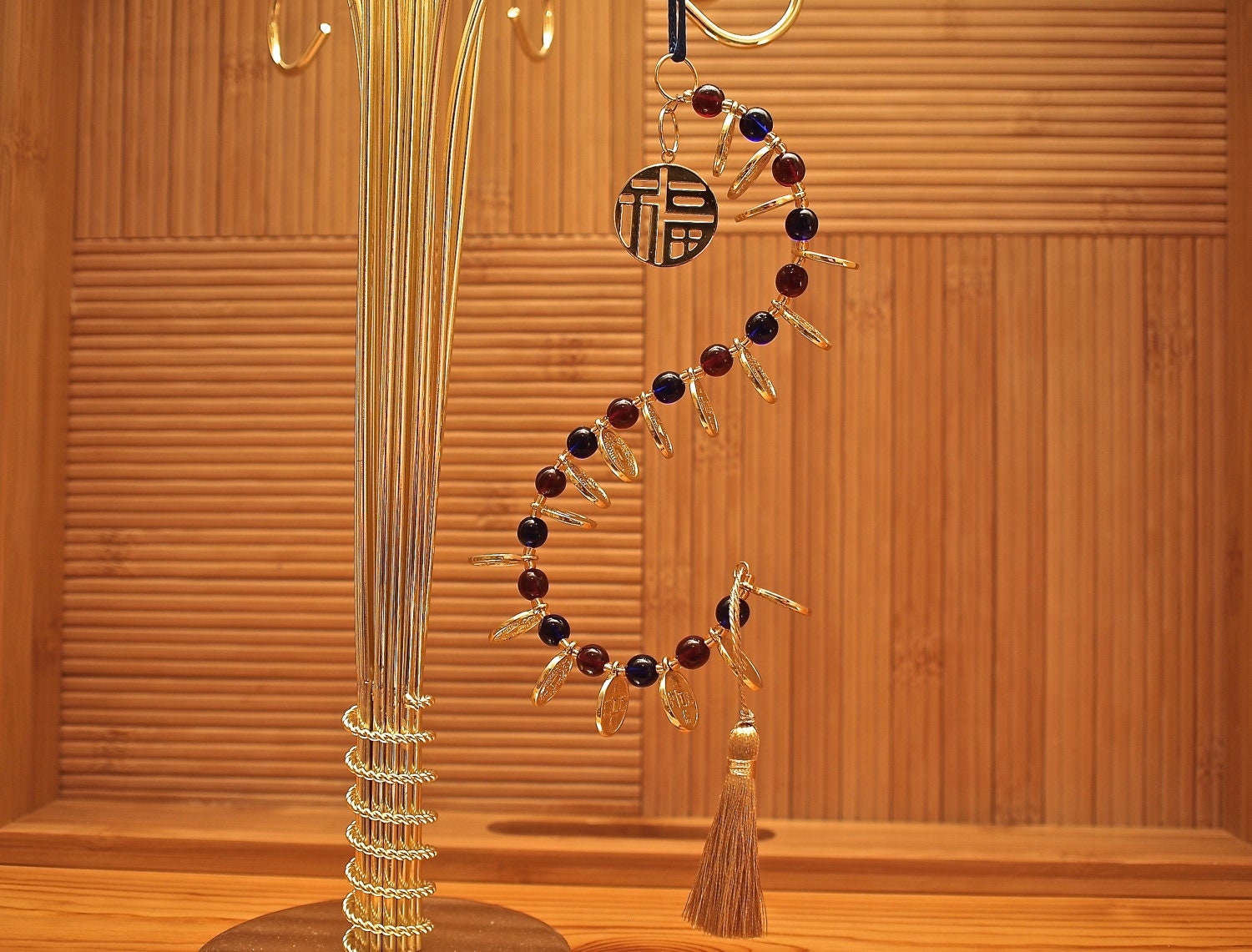Asian Inspired Traditional Gold Good Luck Charm With Garnets, Cobalt Beads & Gold Coins - StringOfLuck