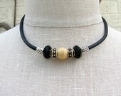 Black gold and silver beaded necklace Mixed metal necklace European style beads Urban chic black rubber necklace Contemporary beaded jewelry