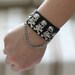 380 Handmade black leather bracelet,  inlaid metal skull punk & pirate style, decorated by a metal chain, suitable for street sports wear