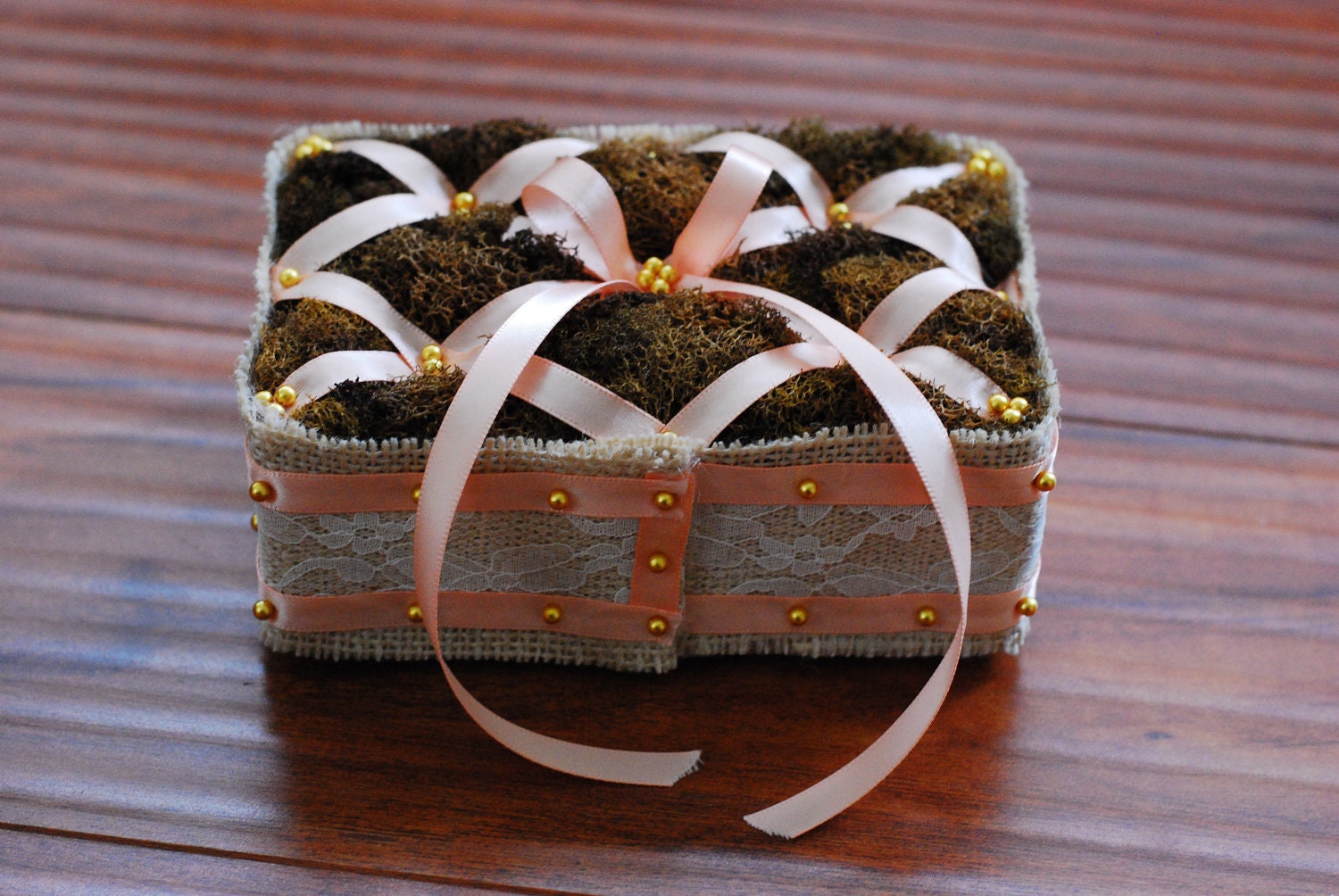 Tufted Moss and Burlap Ring Bearer Pillow with Peach Ribbon and Ivory Lace.