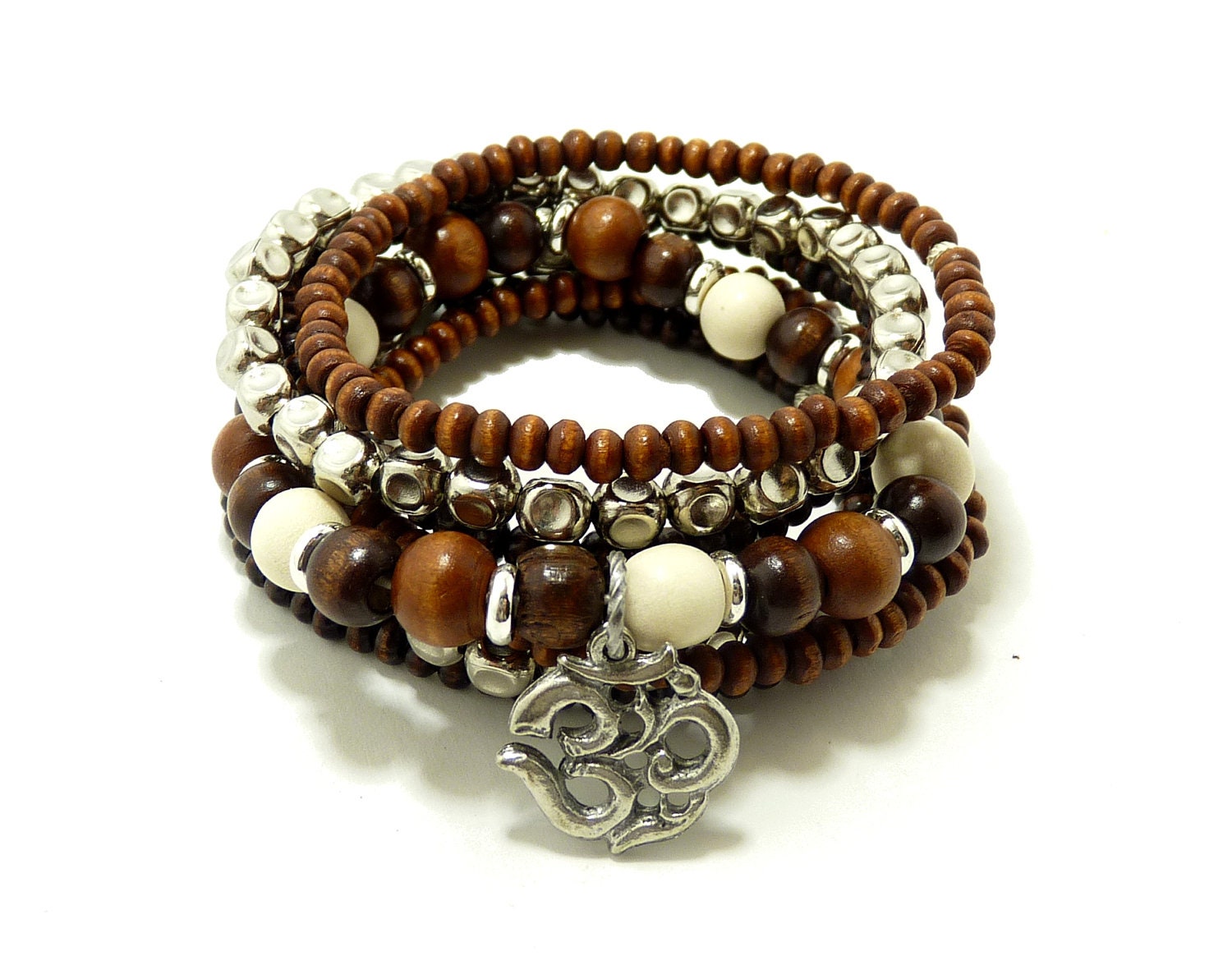 7 strand stretchable stack bracelets with brown color in silver. By Simply Uniq Fashion Bracelet.