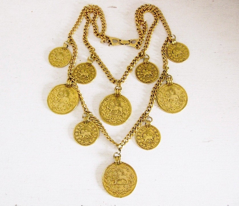 1960s necklace. goldette gold lion coin medallion set. EGYPTIAN GODDESS.