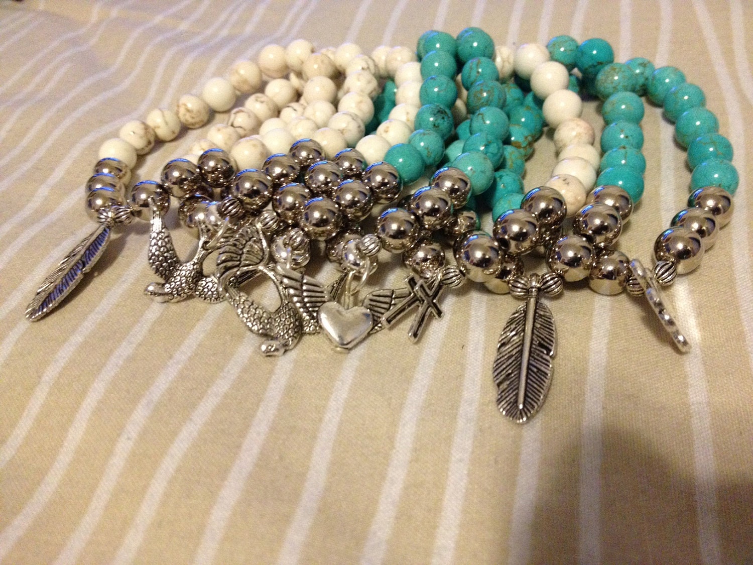 Howlite beaded charm bracelets - turquoise and white / cream howlite stone beads - gemstones with metal charm