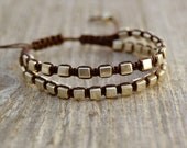 Double row macrame bracelet. Metallic silver and brown adjustable nylon bracelet