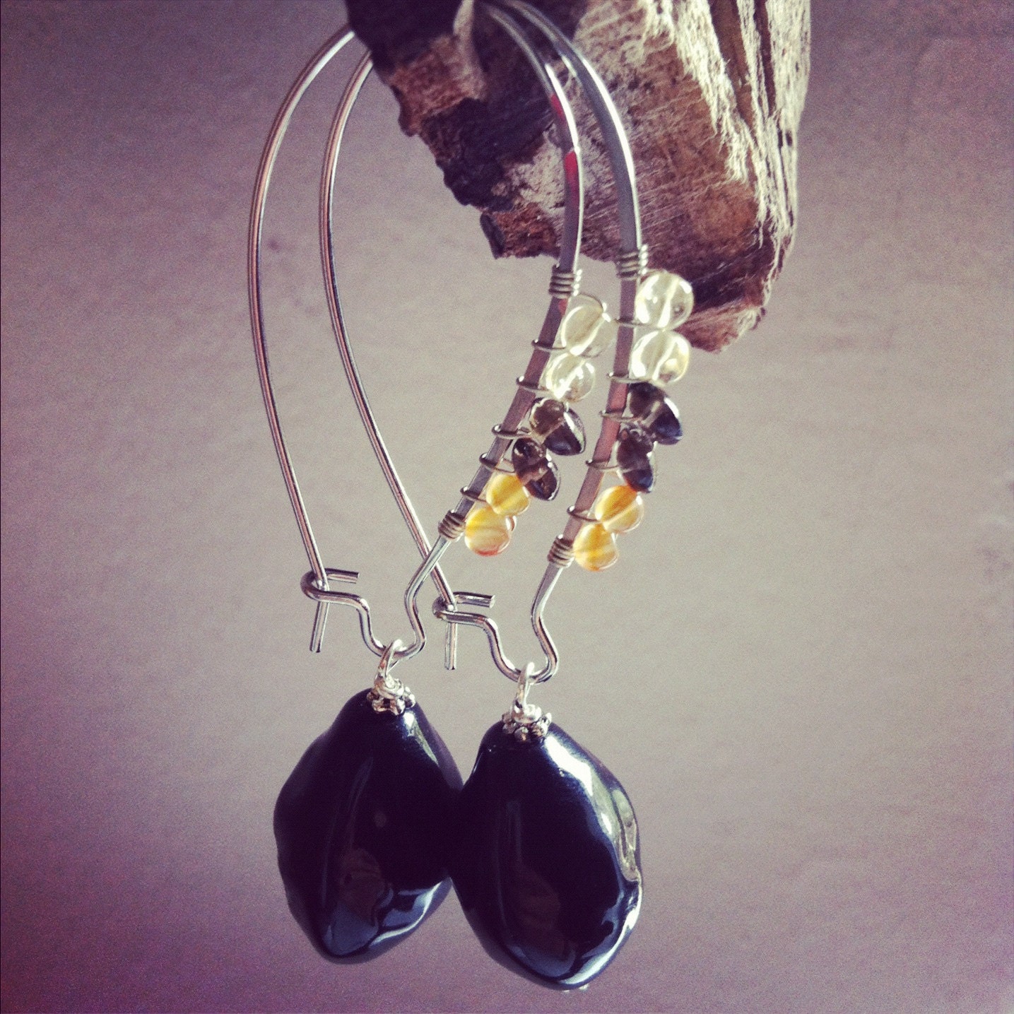 wire wrapped with quartz, citrine and carnelian with black ceramic bead