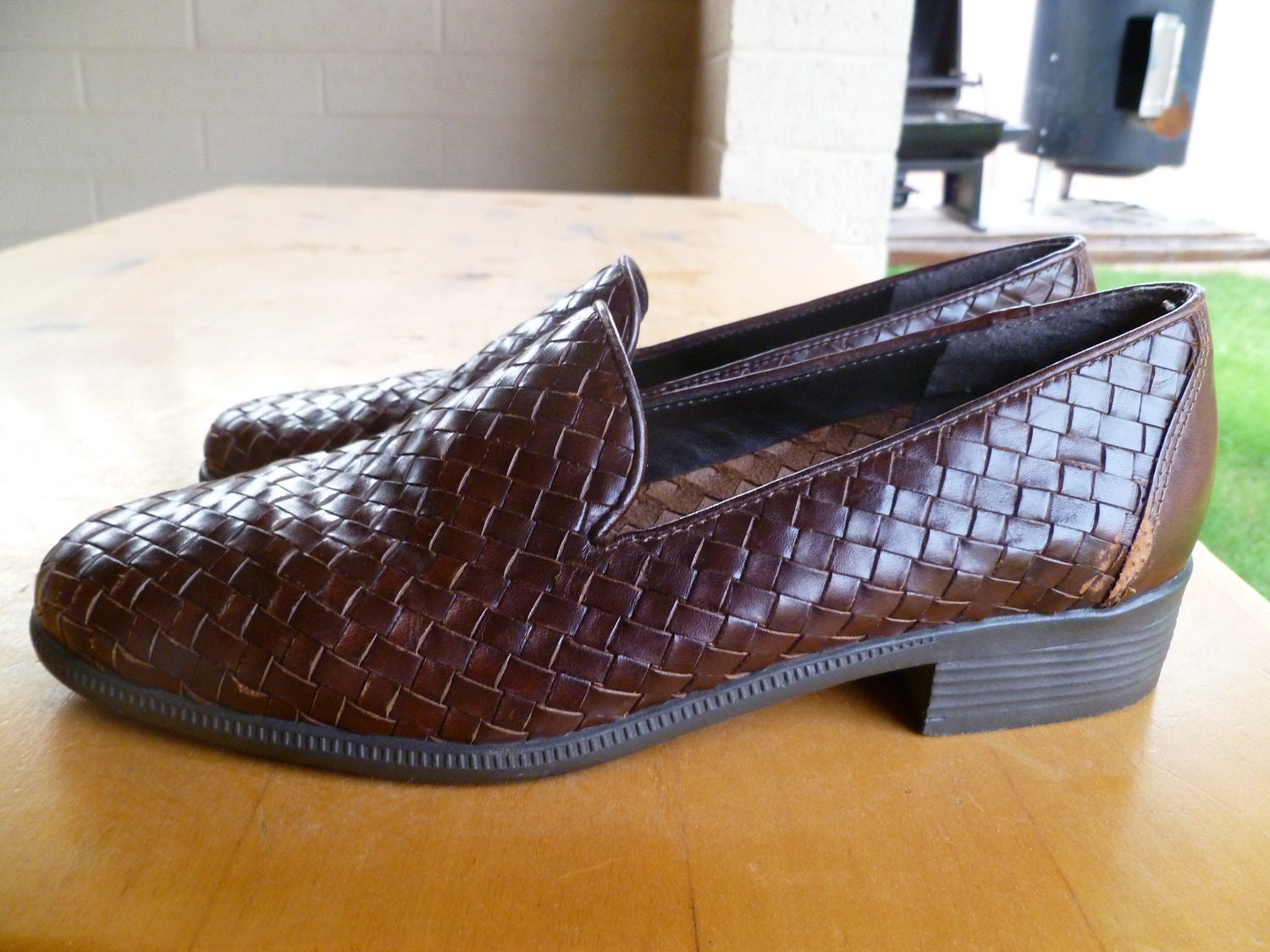 Dark brown flat woven leather loafers--women's 7M