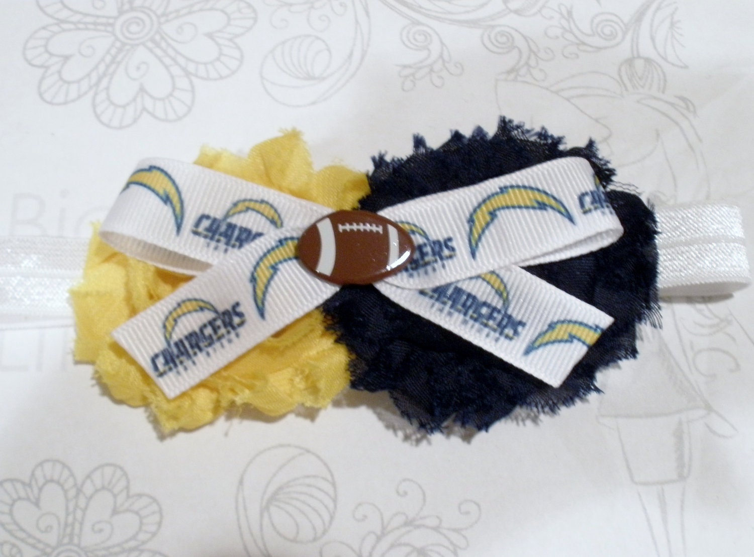 San Diego Chargers NFL shabby headband with bow and football embellishment, fits newborn-adult, can also be put on a clip