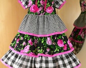 Girls cotton peasant style dress. Size 4T. Black and pink rose with gingham,