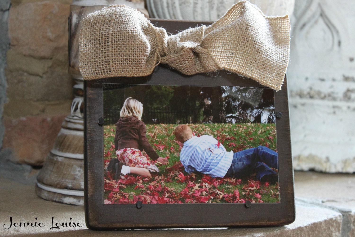 Brown Distressed Wooden Frame with a Natural Burlap Bow