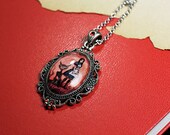 Madness returns Alice in Wonderland - cabochon covered pendant