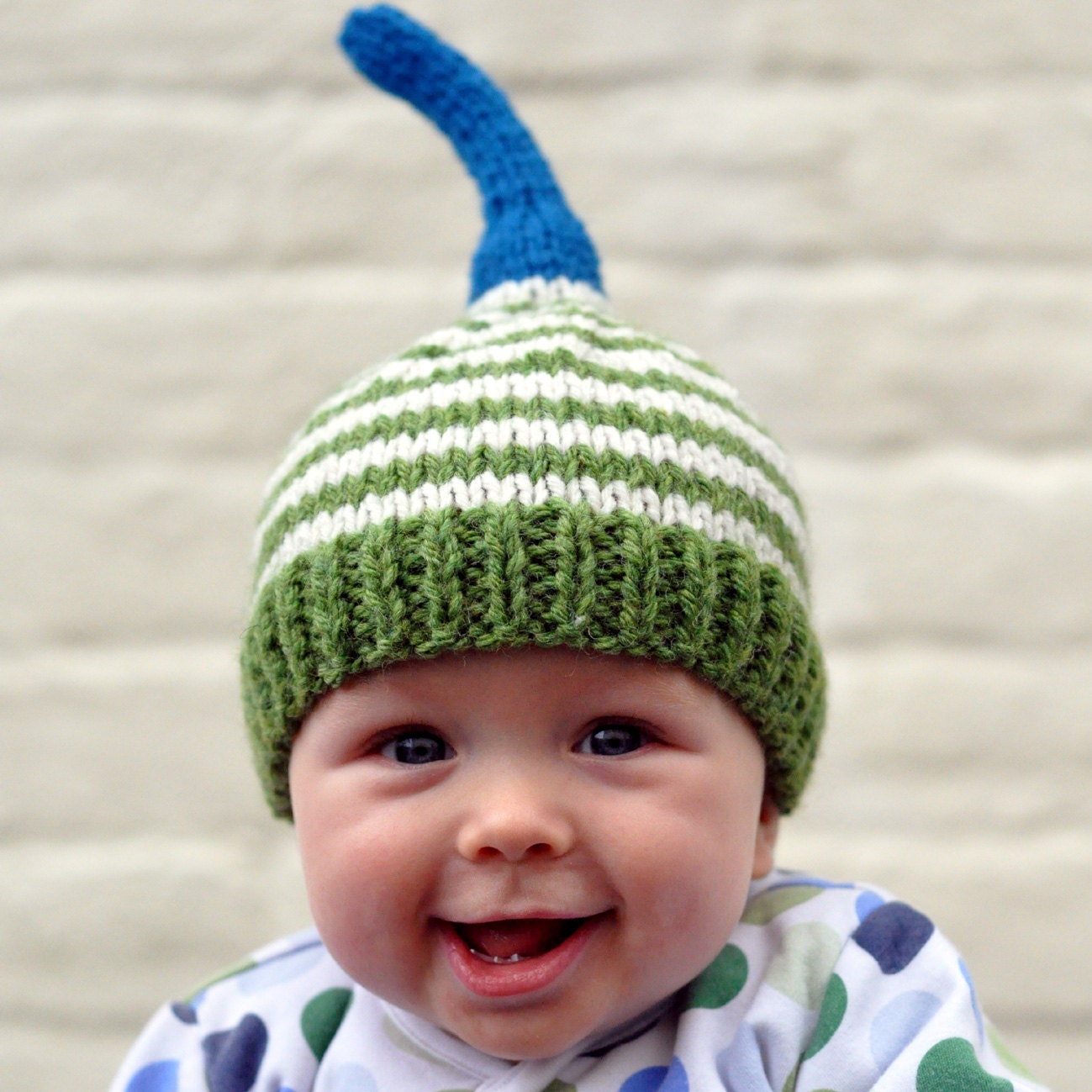 The Knitted Natty Hat in Green and Cream Stripe