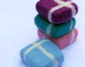 4 little felted soaps in light blue, purple, petrol and pink color