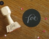 handlettered stamp "Love" by bastisRIKE