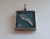 Ala/Wing pendant