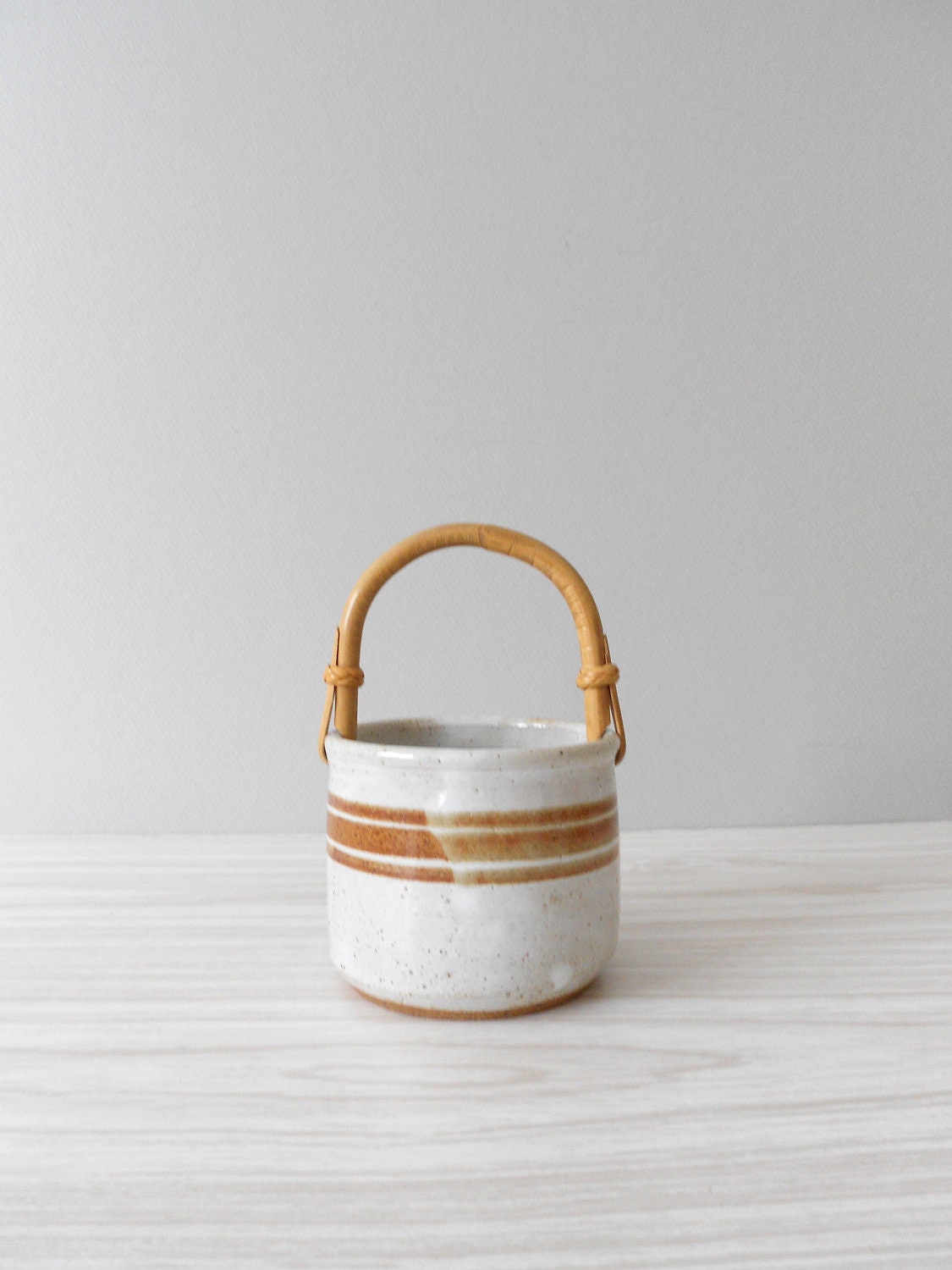 clay basket container with wood handle // striped