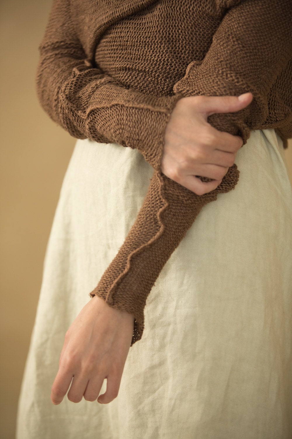 brown cardigan or,knit sweater