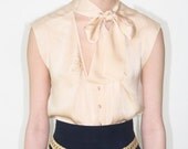 REDUCED was 339 now 300 divine vintage CHANEL nude silk pussy bow blouse w/pearl buttons