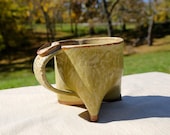 Handbuilt tripod mug