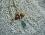 Beach glass necklace in aquamarine. Wire wrapped sea glass jewelry.